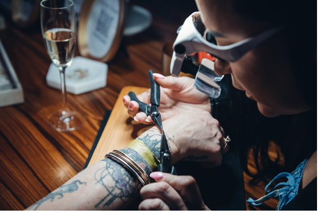 Permanent jewelry being welded at a private party near Seattle