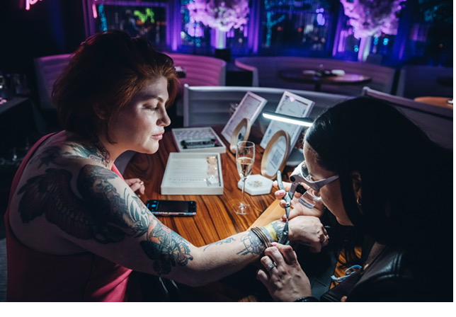 Permanent jewelry welding at a girls' night event