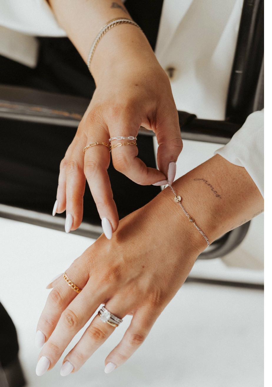 Delicate gold-filled permanent bracelet on wrist
